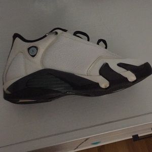 A pair of white and black Jordan 14 size 7